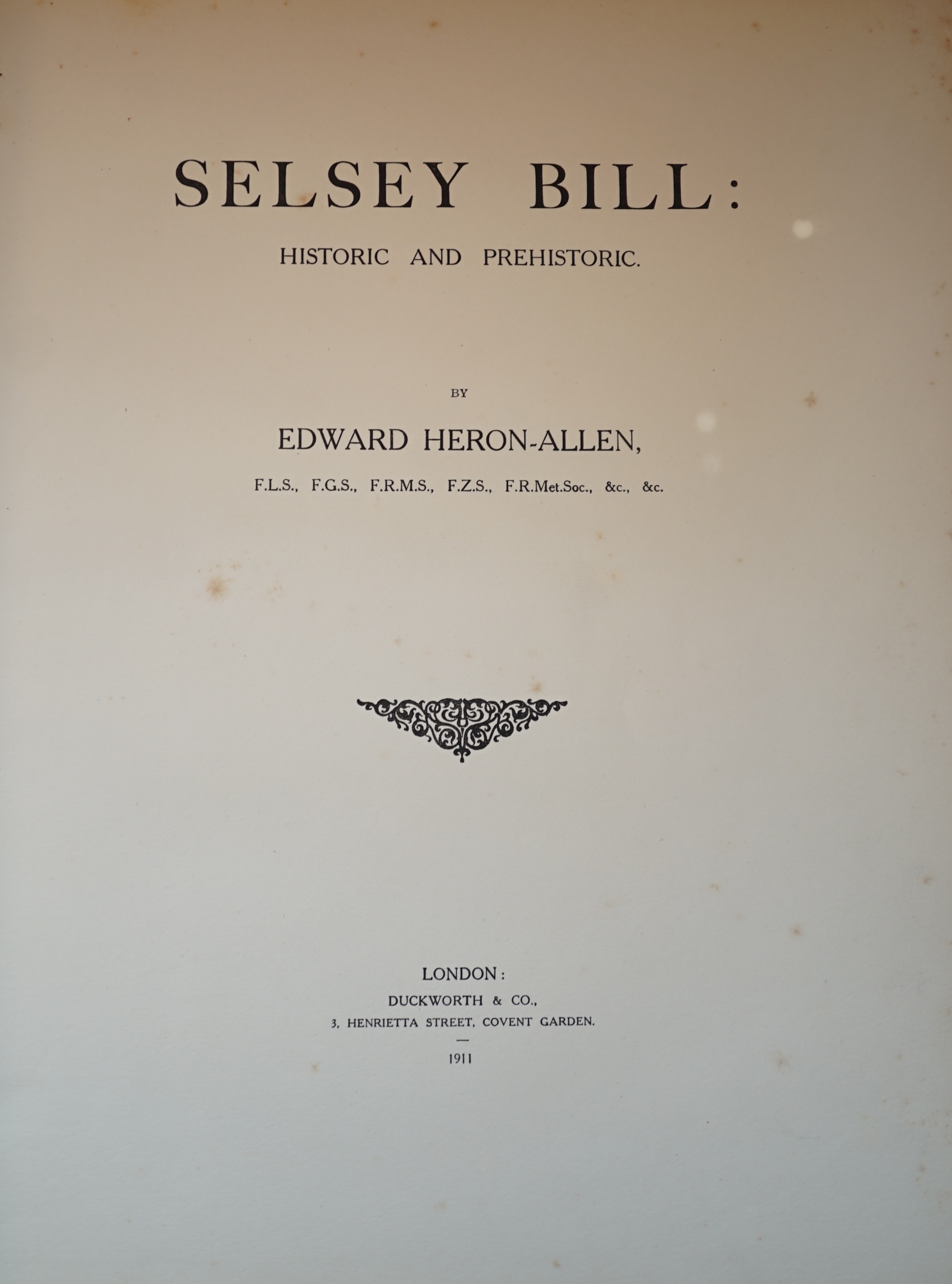 Heron-Allen, Edward - Selsey Bill: Historic and Prehistoric, 4to, cream buckram, author's presentation inscription to half title, numerous plates, 3 folding maps to rear pocket, Duckworth & Co., London, 1911.